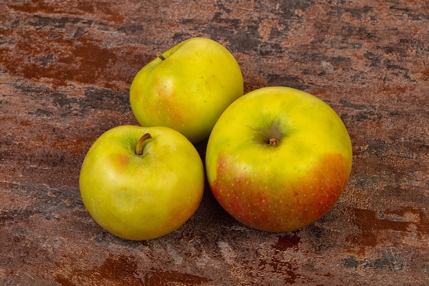 Ripe apples over background