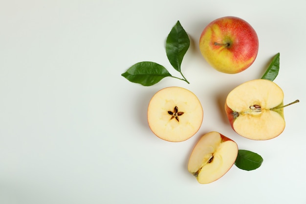 Ripe apples on white background, top view