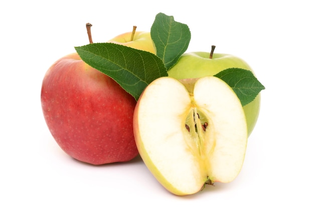 Ripe apples on a white surface isolated