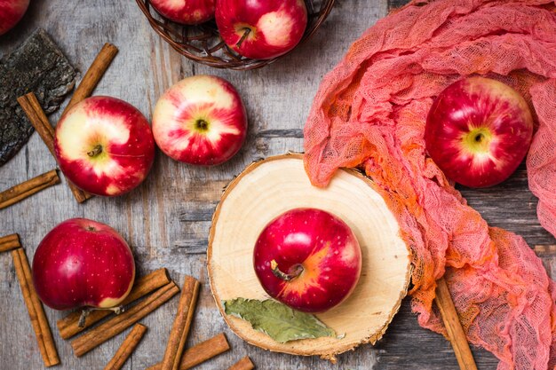 Ripe apples on a wooden table. Top view