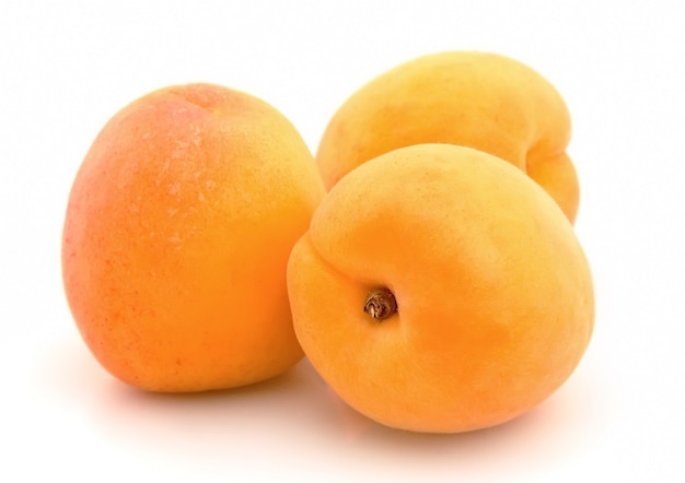 Ripe apricot on white background