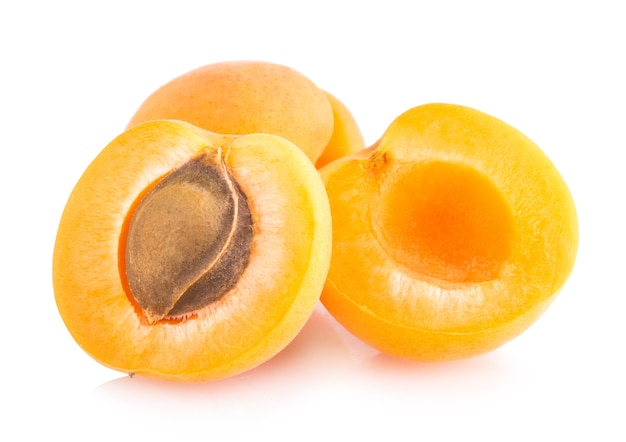 Ripe apricots isolated on white background