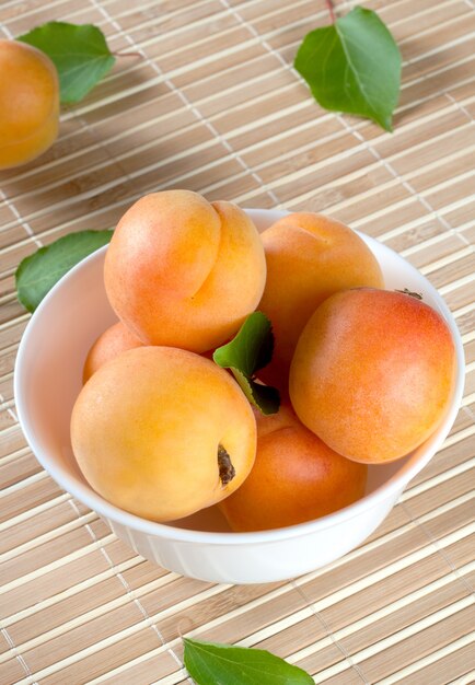 Ripe apricots on a plate