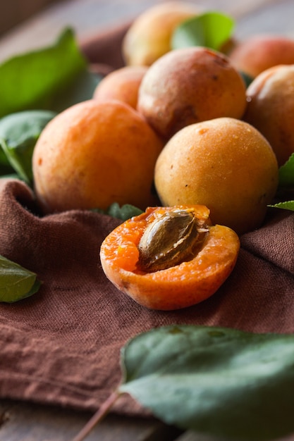 Ripe apricots on the wooden table