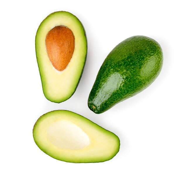 Ripe avocado and two halves isolated