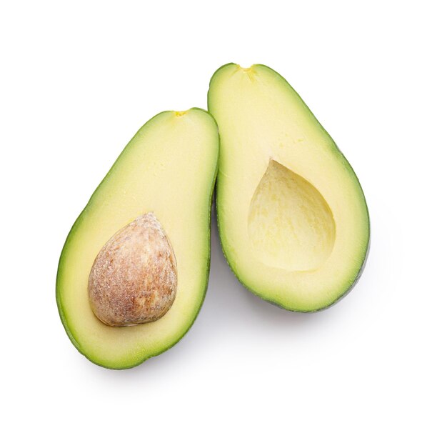 Photo ripe avocado on a white background halves of avocado