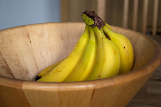 Ripe Bananas in Bamboo Wood Fruit Bowl