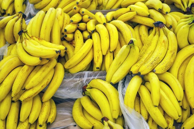 Ripe bananas on the counter selling fruit