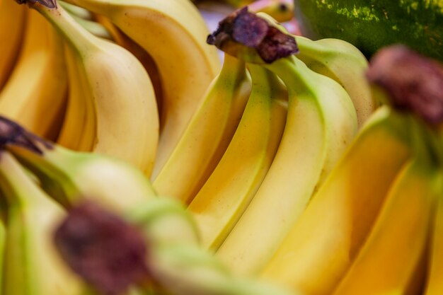 Ripe bananas on a market counter. Vitamins and a healthy diet. Close-up.