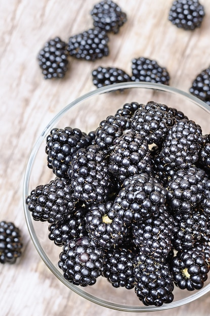 Ripe blackberry in glass bowl