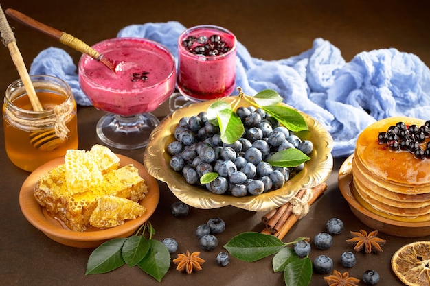 Ripe blueberries, in composition on an old surface.