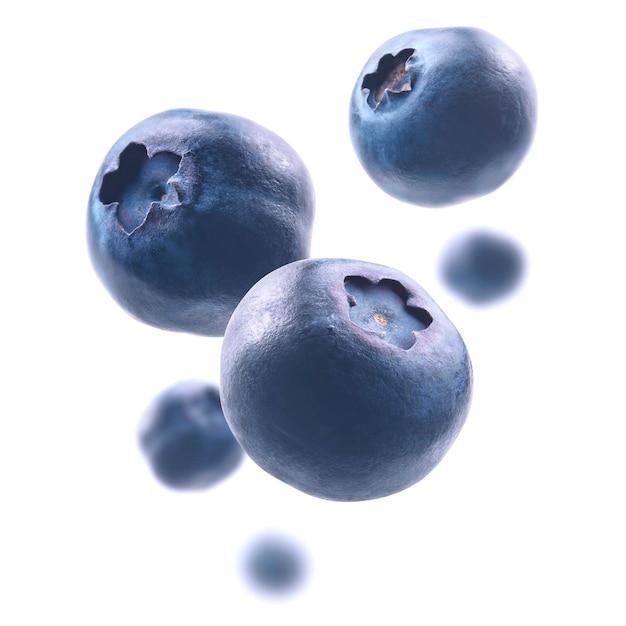 Ripe blueberries levitate on a white background