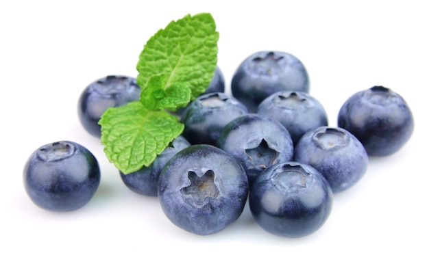 Ripe blueberry with mint closeup