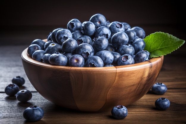 Ripe blueberry in a wooden bowl on a rustic wooden table