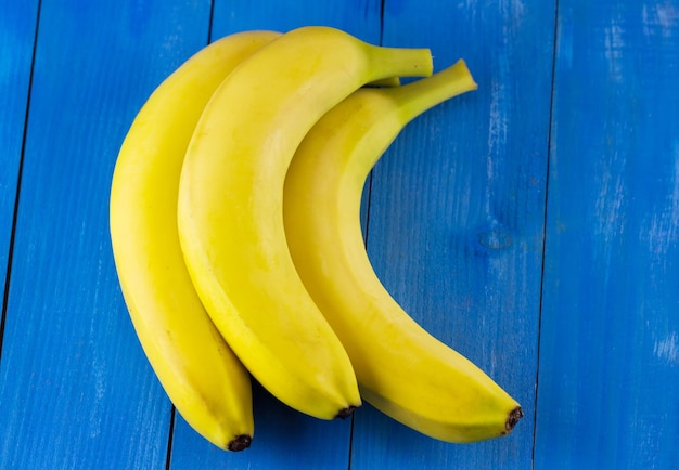 Ripe bunch of bananas on a bright surface