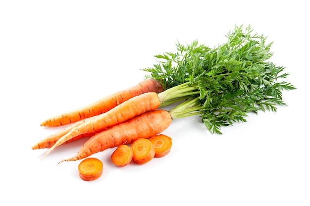 Ripe carrots with leaves on white backgrounds. Organic vegetables.