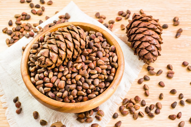 Ripe cedar cones and pine nuts in shell