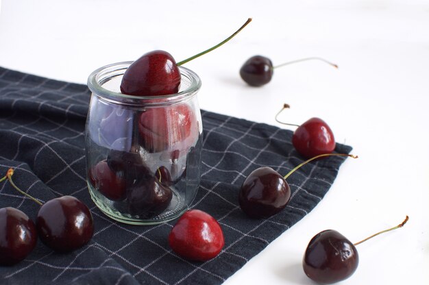 Ripe cherries Glass jar 