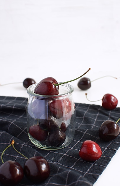 Ripe cherries Glass jar