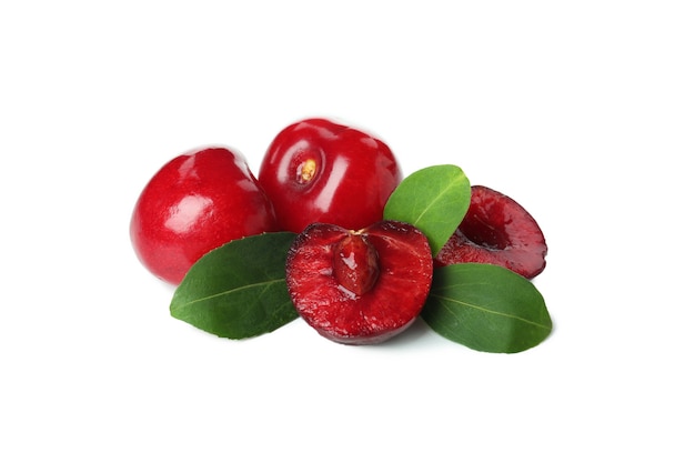 Ripe cherry with leaves isolated on white background