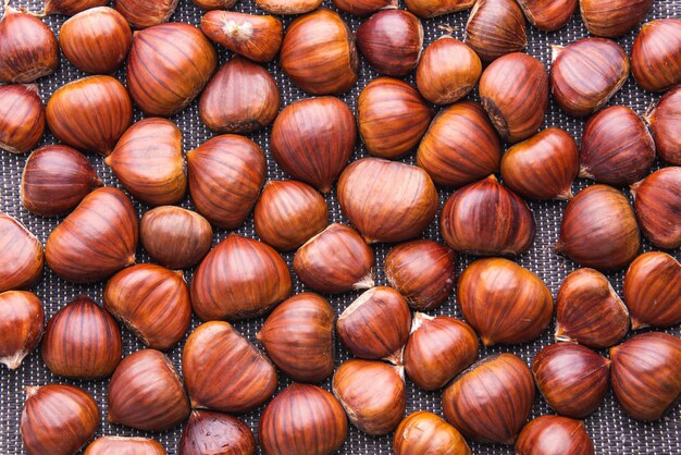 Ripe chestnuts close up Raw Chestnuts for Christmas Fresh sweet chestnut