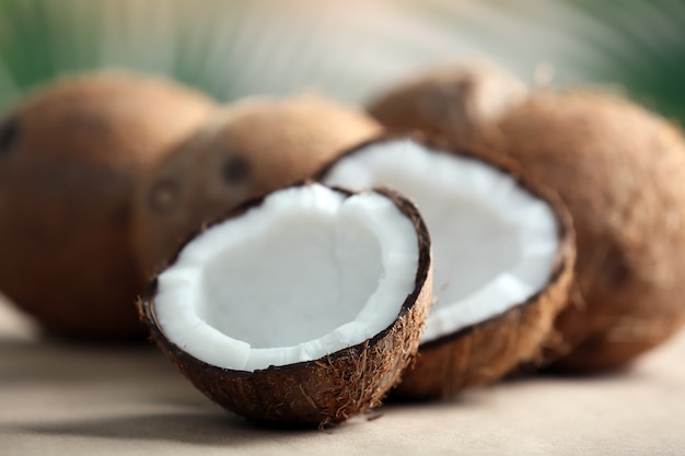 Ripe coconuts on table