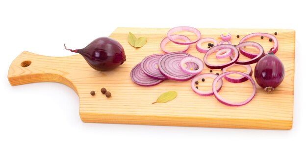 Ripe cut onions on board