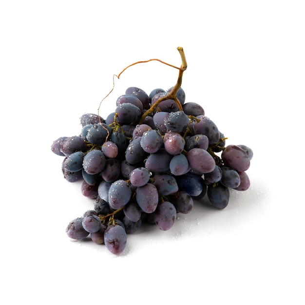 Ripe dark grapes on white wooden surface close up