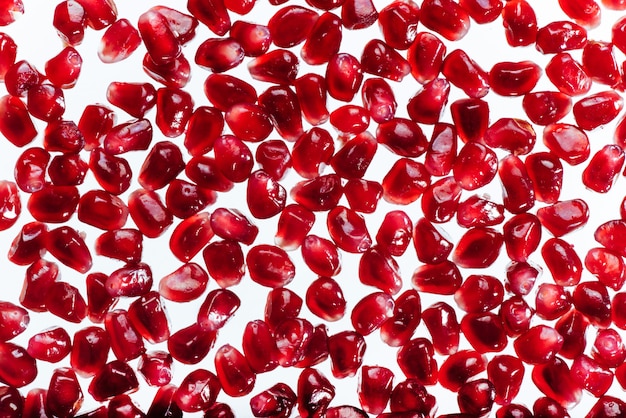 Ripe, delicious, juicy red pomegranate seeds.