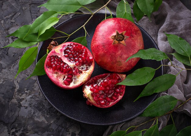 Ripe dissected pomegranates. Selective focus