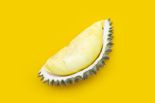 Ripe durian on yellow background