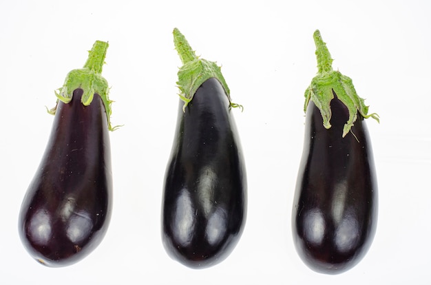 Ripe eggplant on white background. Studio Photo.