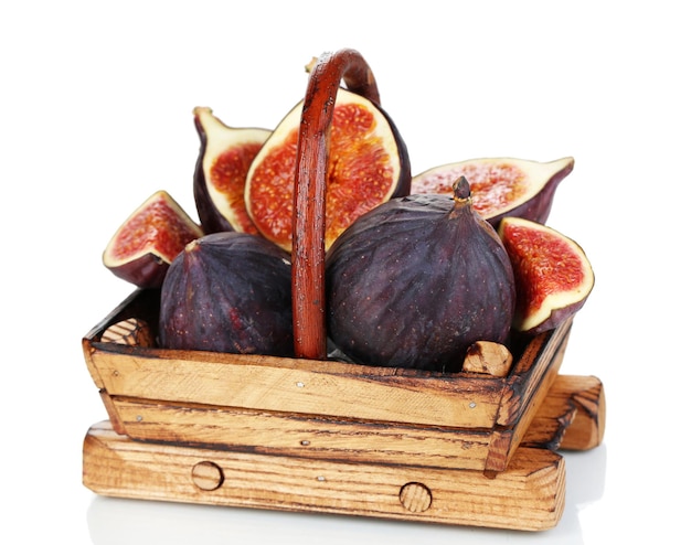 Ripe figs in basket isolated on white