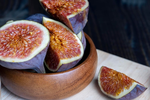 Ripe figs cut into pieces close up