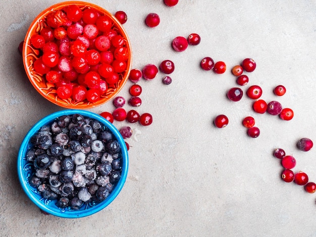 Ripe forest berries cranberries and blueberries