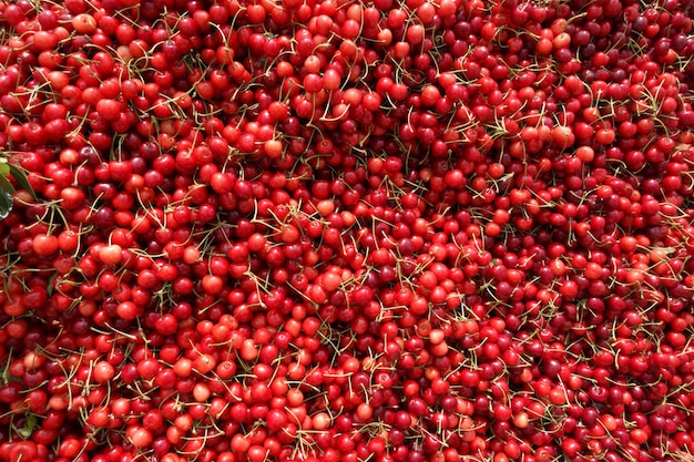 Ripe fresh cherry on a white tray