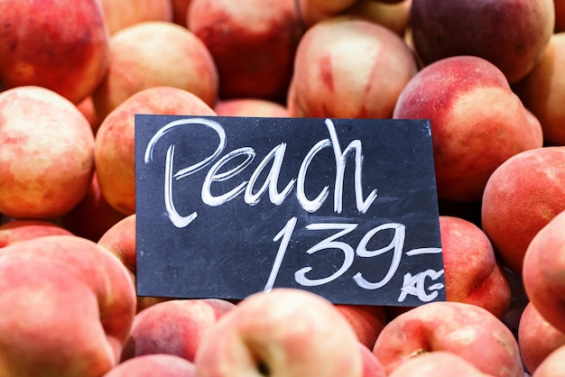 Ripe fresh peaches for sale in supermarket