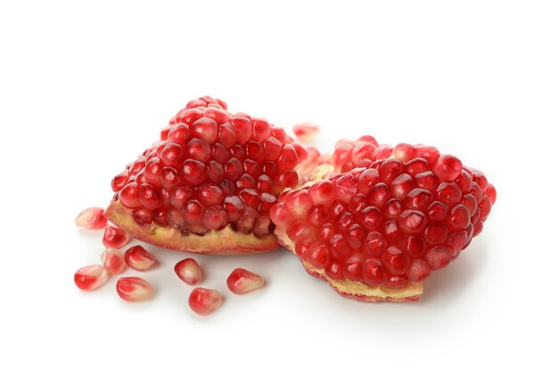 Ripe fresh pomegranate isolated on white background