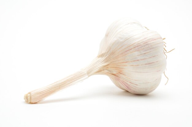 Ripe garlic on isolated white background