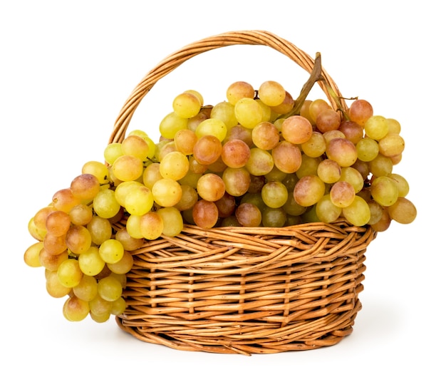 Ripe grapes in a basket close-up on a white background. Isolated