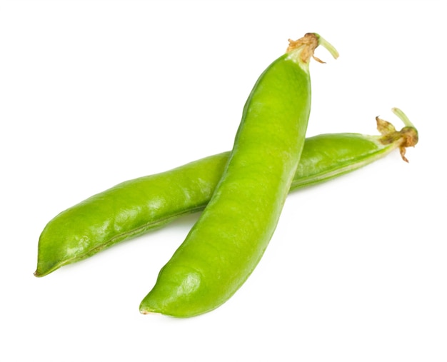 Ripe green peas in the shell isolated