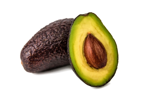 Ripe healthy avocado on white background