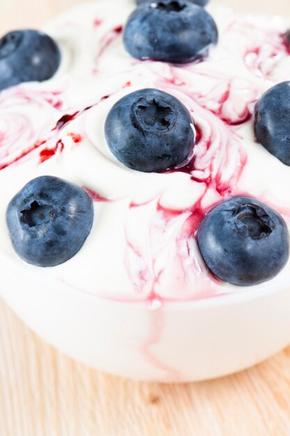 Ripe and healthy blueberries with sauce and harvested