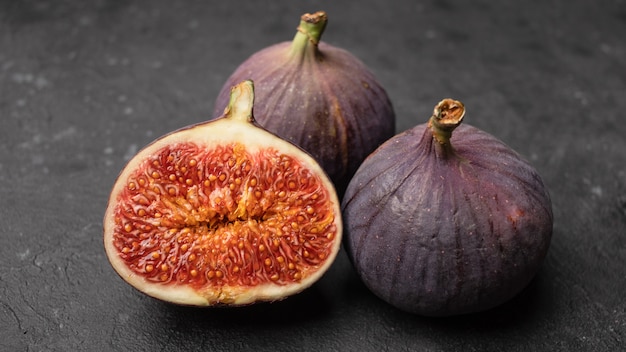 Ripe juicy figs cut in half style.
