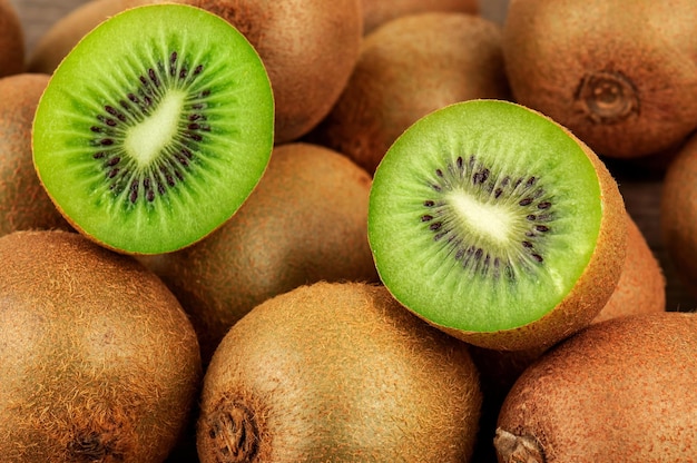 Ripe and juicy kiwi fruits as a texture