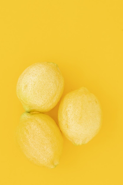 Ripe juicy lemons Lemon fruit citrus minimal concept vitamin C Creative summer minimalistic back