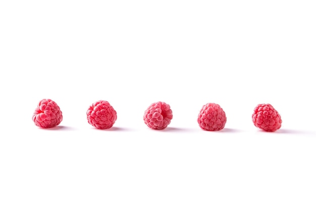 Ripe juicy raspberry isolated on white background