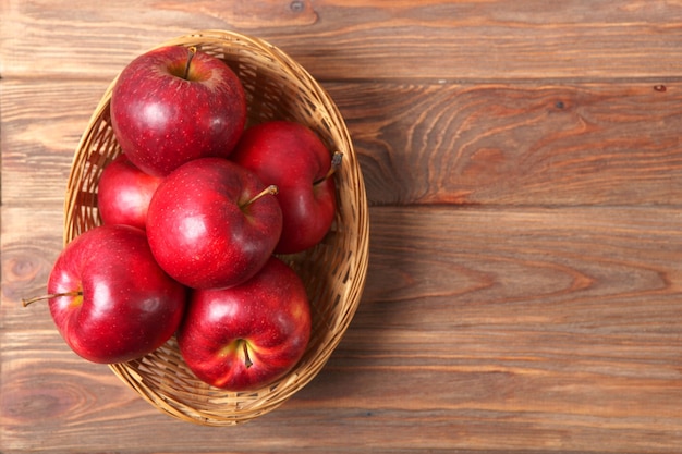 Ripe juicy red apples on the table