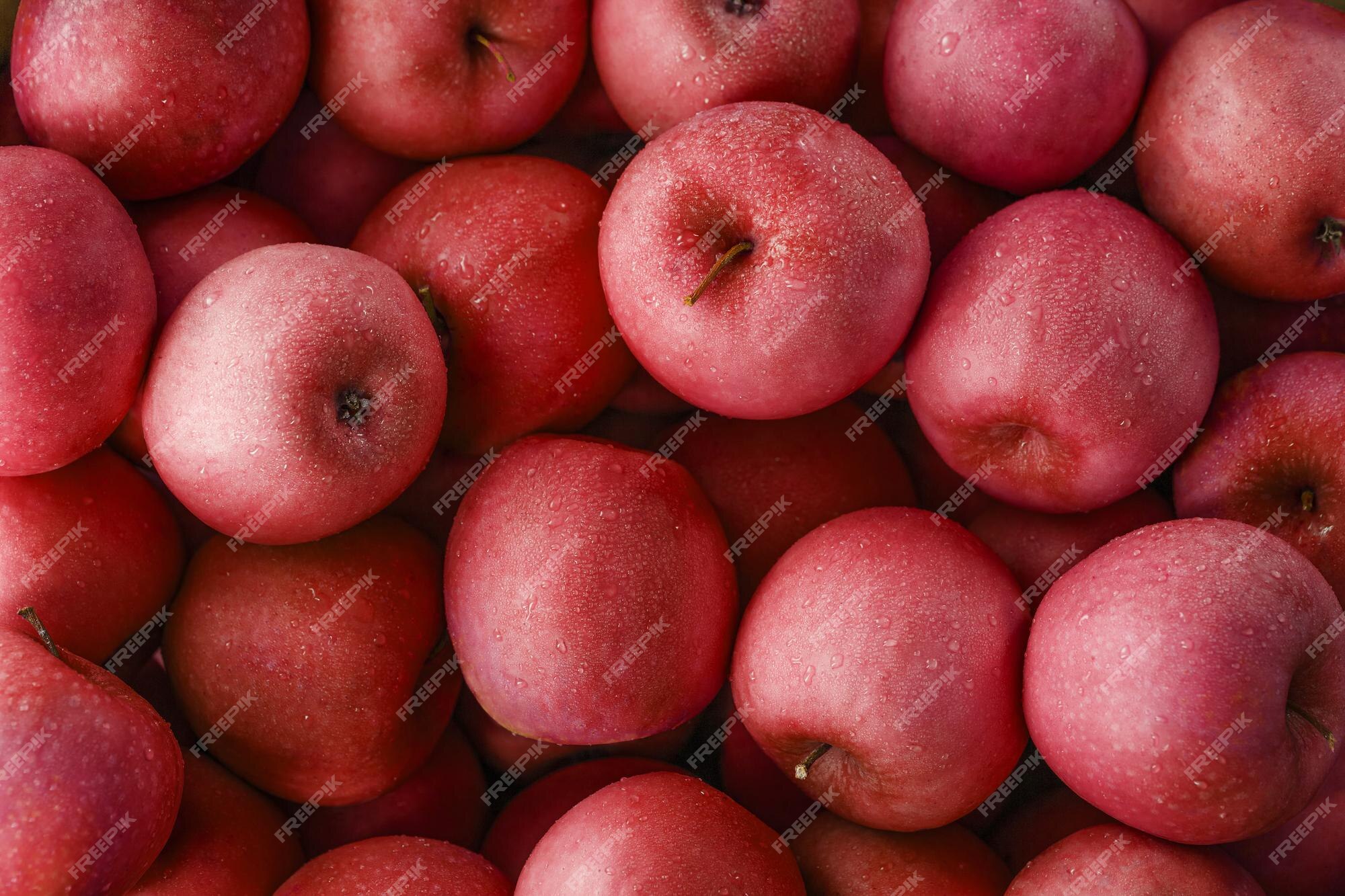 Premium Photo  Ripe and juicy green apples with dew drops.