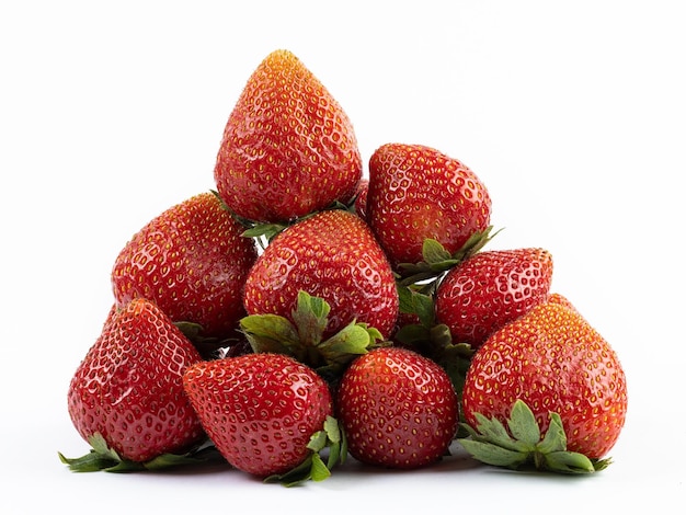 Ripe and juicy red strawberries on white background.